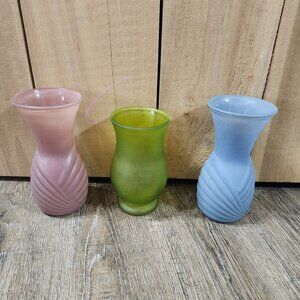 three vintage glass vases